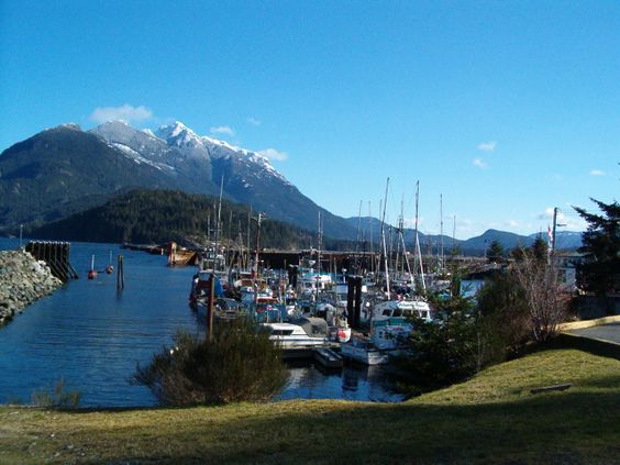 At the wharf in Sayward, BC, Canada. with Mt. H'Kusam in the background.
