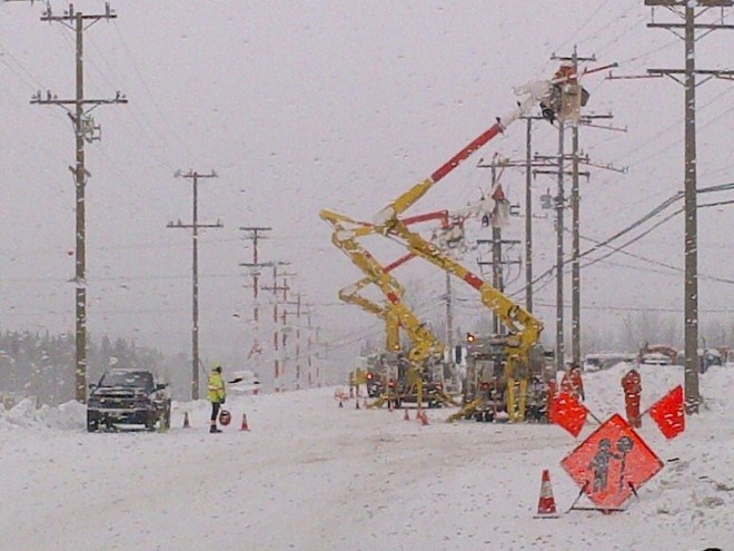 Crews upgrading power lines in snowy conditions in Smithers BC (2012). Source: BC Hydro.com