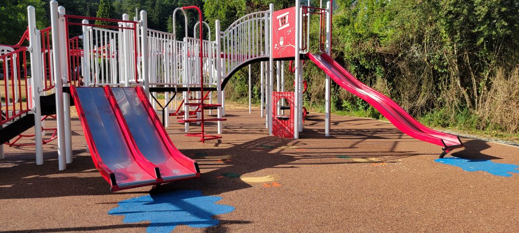 Recycled tires are made into surfaces for playgrounds, roads, and sports tracks. The surface at the playground at Kin Duck Pond in Lake Cowichan was installed last year. 