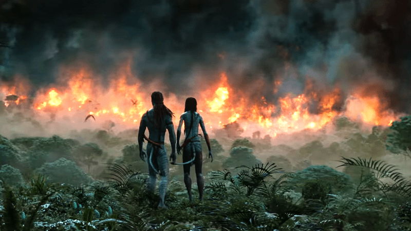The main characters of avatar watching the forest of Pandora being burned.