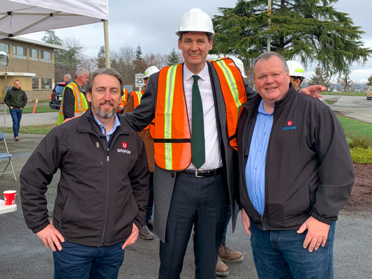 B.C. Premier David Eby with Unifor Western Regional Director Gavin McGarrigle and Local 1132 president Travis Gregson outside the Crofton mill. 