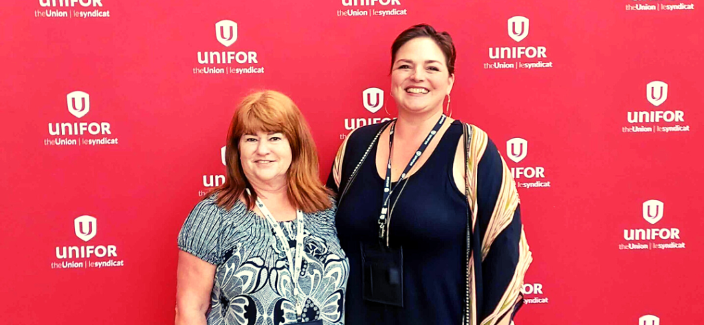 Standing alongside Unifor National Representative Sandy McManus (left) is Emily Orr (right), who is representing UFAWU at the Unifor Constitutional Convention. Source: UFAWU-Unifor Fishermen | Facebook.com