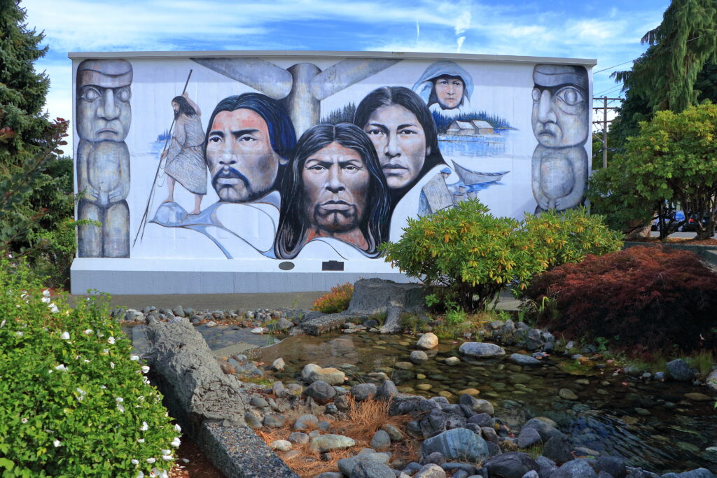 Famous mural of Native Coast Salish chiefs in Heritage Park in the small port town of Chemainus, B.C.