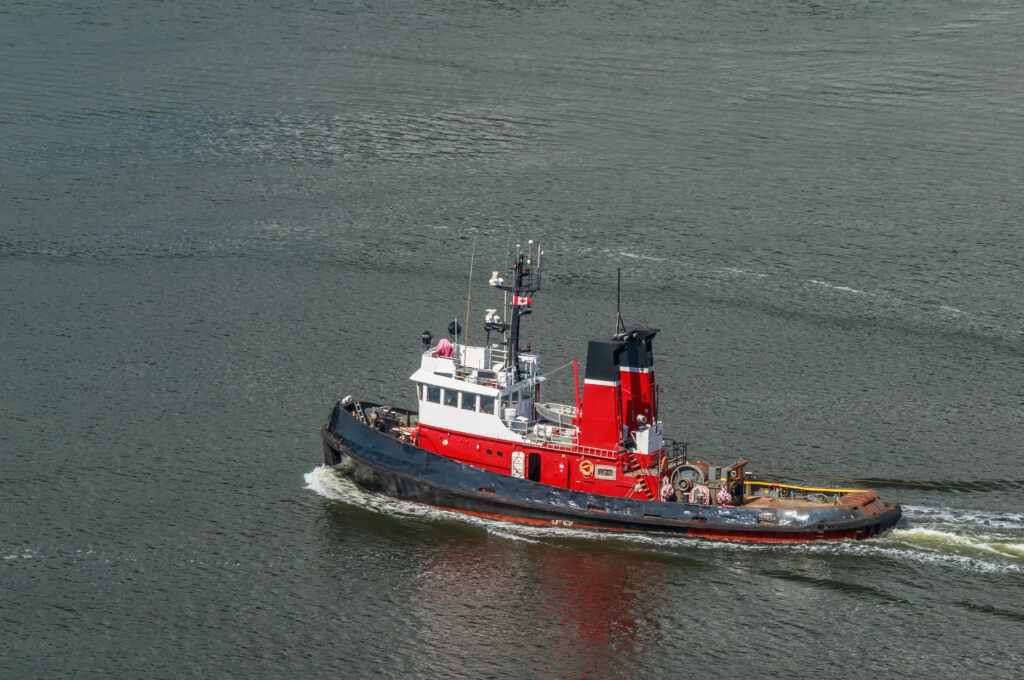 Tugboats play a crucial role in transporting goods and people along the coastal waters of British Columbia, Canada.