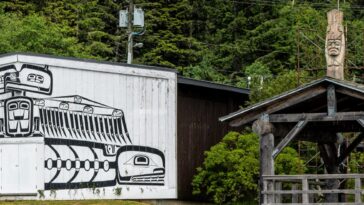 The ‘Na̱mǥis Traditional Big House at ‘Yalis, Cormorant Island was built in 1965. It is modelled after the traditional residences of the Kwakwaka’wakw. ʼNa̱mǥis lands have never been ceded to any other entity, government, or outside agent.