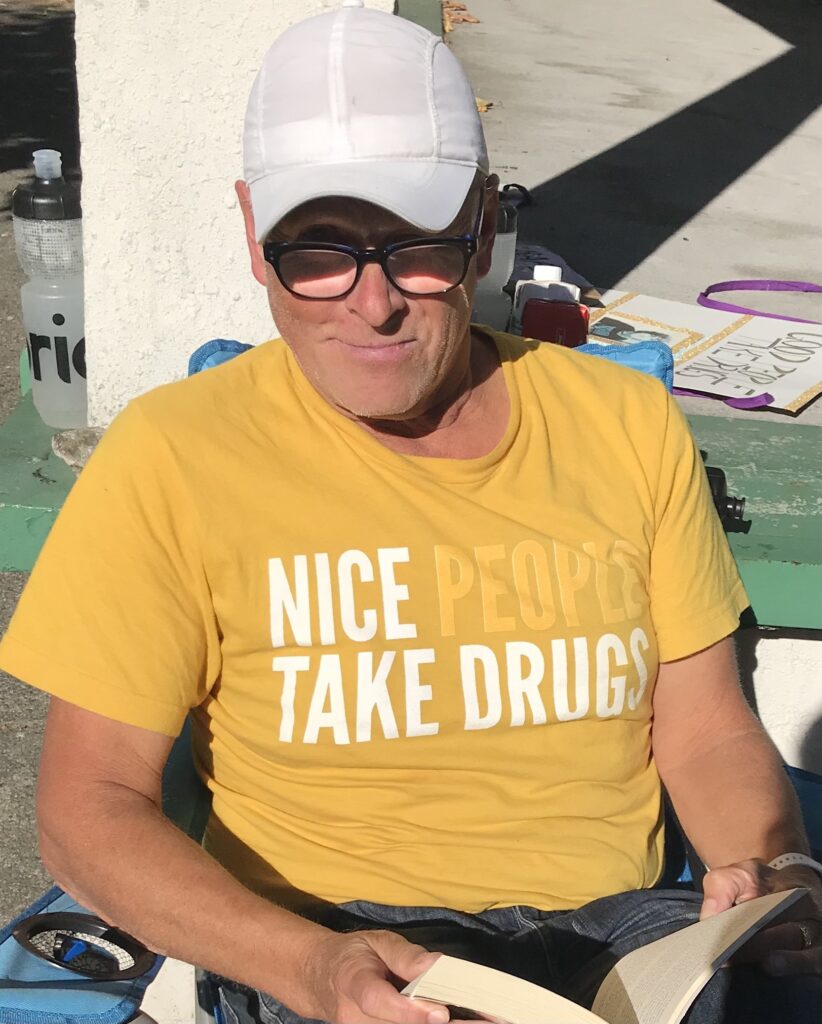 "Faces of Aubrey's Marathon a Day for Safe Drug Supply" featuring James Melling.