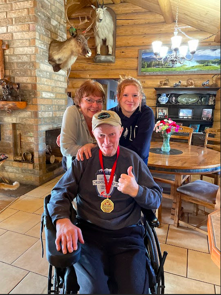 Champions are made by the support of their loved ones. Sara McPhail celebrates her victory with her family, including her proud grandparents.
