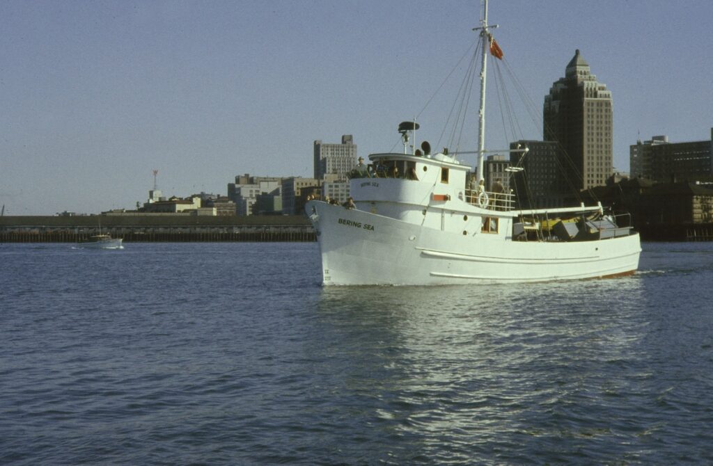 The first steel seiner designed by Robert Allan was Bering Sea, built by John Manly in Vancouver in 1959 when the Marine Building still dominated the waterfront. Image Credit: Murray McLellan, Vancouver Maritime Museum, VMM55.01.02A.56