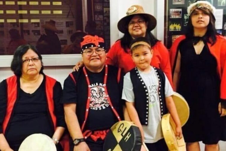 Juanita Hill (left), with her husband Murray Hill and their daughter and grandchildren.